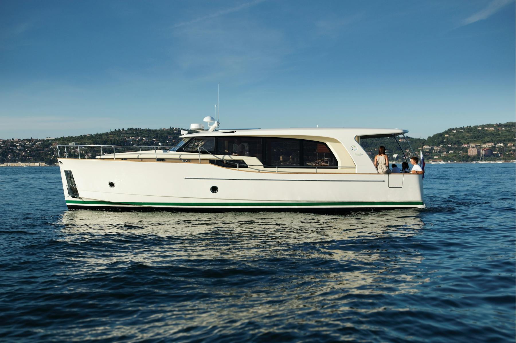 Greenline 40 with people in the aft cockpit